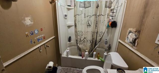 308 Oregon St, Birmingham, AL 35224 - bathroom with toilet and shower / tub combo with curtain