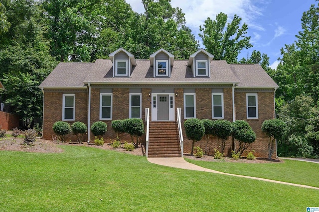110 Pine Cliff Cir, Hoover, AL 35226 - cape cod home featuring a front lawn and brick siding