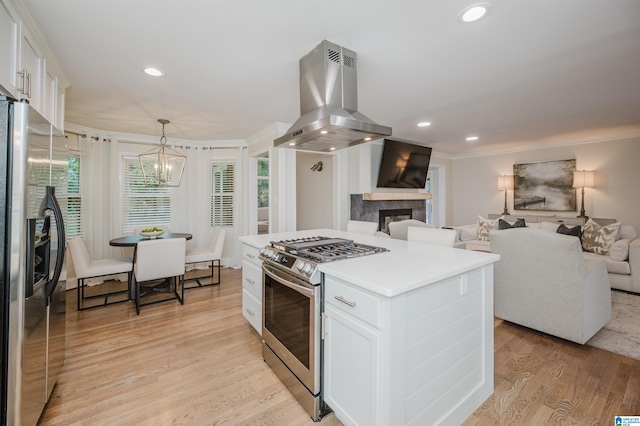 110 Pine Cliff Cir, Hoover, AL 35226 - kitchen featuring stainless steel appliances, range hood, light wood-type flooring, white cabinetry, and open floor plan