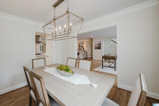 110 Pine Cliff Cir, Hoover, AL 35226 - dining room with a chandelier, wood finished floors, ornamental molding, and stairway