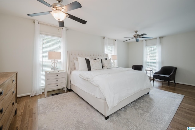 110 Pine Cliff Cir, Hoover, AL 35226 - bedroom with wood finished floors and a ceiling fan