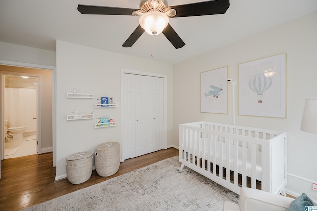 110 Pine Cliff Cir, Hoover, AL 35226 - bedroom featuring wood finished floors, a closet, a nursery area, and a ceiling fan