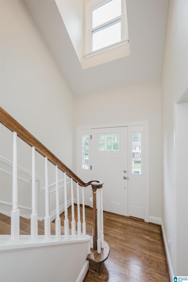 110 Pine Cliff Cir, Hoover, AL 35226 - foyer featuring wood finished floors, stairs, and high vaulted ceiling