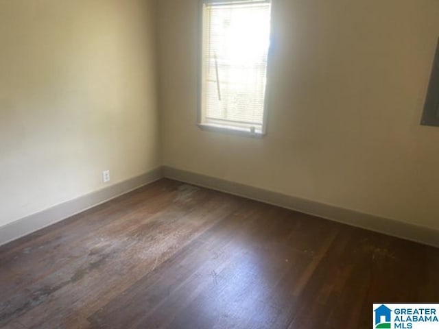 605 39th Pl, Fairfield, AL 35064 - empty room with baseboards and wood finished floors
