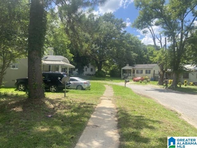 605 39th Pl, Fairfield, AL 35064 - view of asphalt street with sidewalks