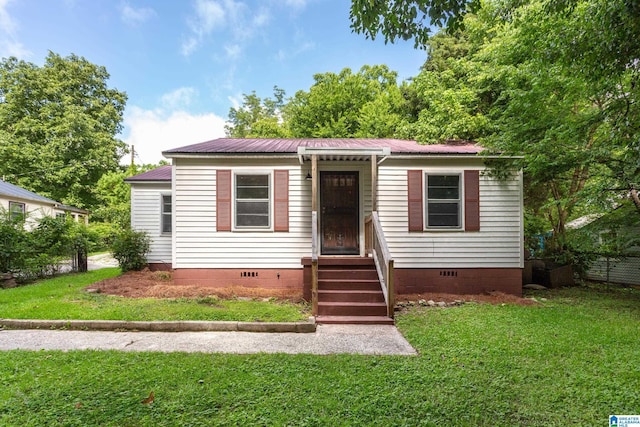 4106 Ridge Dr, Anniston, AL 36206 - view of front facade with crawl space and a metal roof