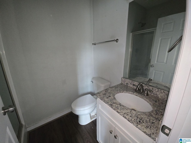 107 Steppville Garden Dr, Hanceville, AL 35077 - bathroom with vanity, wood finished floors, and a shower
