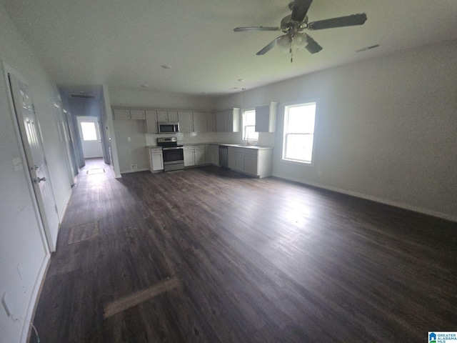 107 Steppville Garden Dr, Hanceville, AL 35077 - unfurnished living room with dark wood-style flooring and a ceiling fan