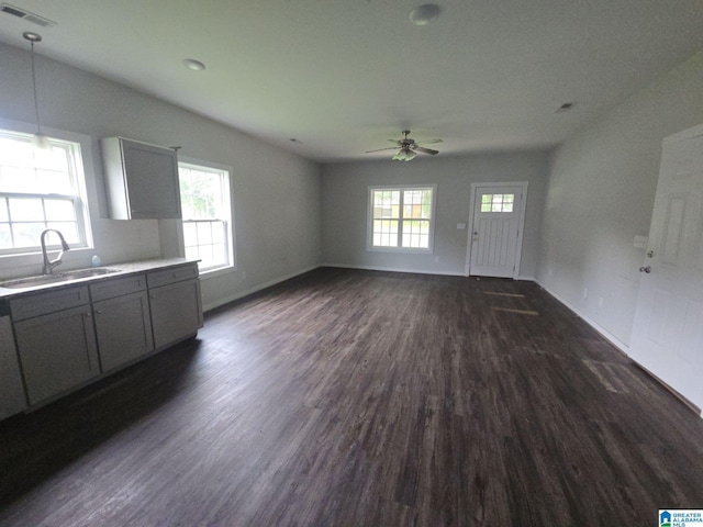 107 Steppville Garden Dr, Hanceville, AL 35077 - unfurnished living room with dark wood-type flooring and ceiling fan