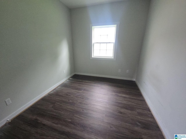 107 Steppville Garden Dr, Hanceville, AL 35077 - empty room featuring dark wood-style flooring and baseboards