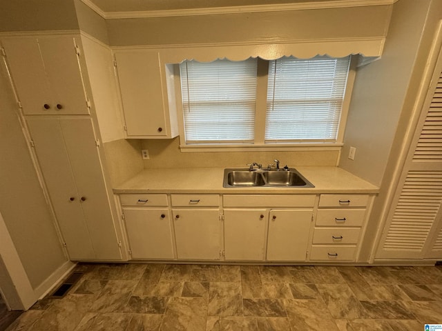 5295 Snowville Brent Rd, Dora, AL 35062 - kitchen with light countertops, white cabinets, and crown molding