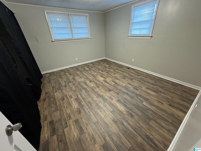 5295 Snowville Brent Rd, Dora, AL 35062 - unfurnished bedroom with dark wood-style flooring and ornamental molding
