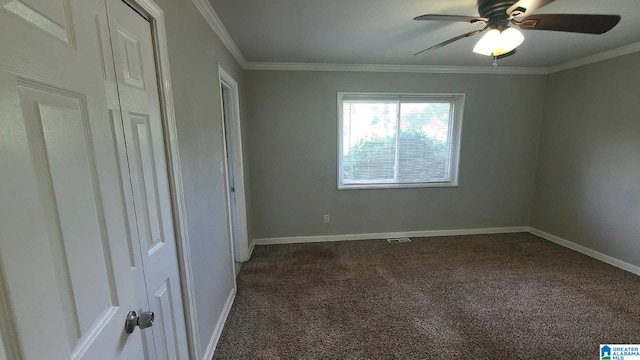 1525 Cresthill Rd, Birmingham, AL 35213 - unfurnished bedroom with dark carpet, ornamental molding, and ceiling fan