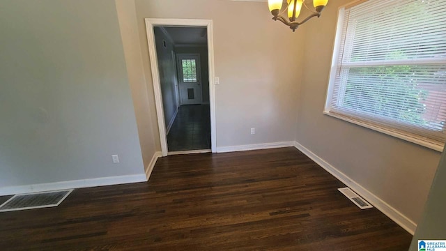 1525 Cresthill Rd, Birmingham, AL 35213 - unfurnished dining area with dark wood-style flooring and a chandelier