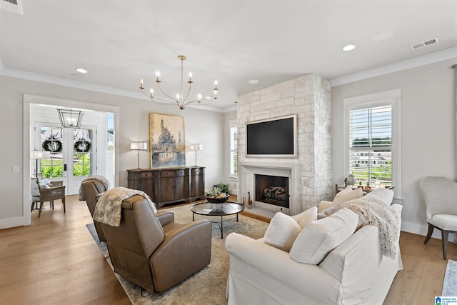 544 Preserve Way, Hoover, AL 35226 - living area with a chandelier, crown molding, plenty of natural light, light wood finished floors, and recessed lighting