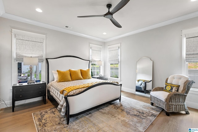 544 Preserve Way, Hoover, AL 35226 - bedroom featuring multiple windows, wood finished floors, crown molding, recessed lighting, and ceiling fan