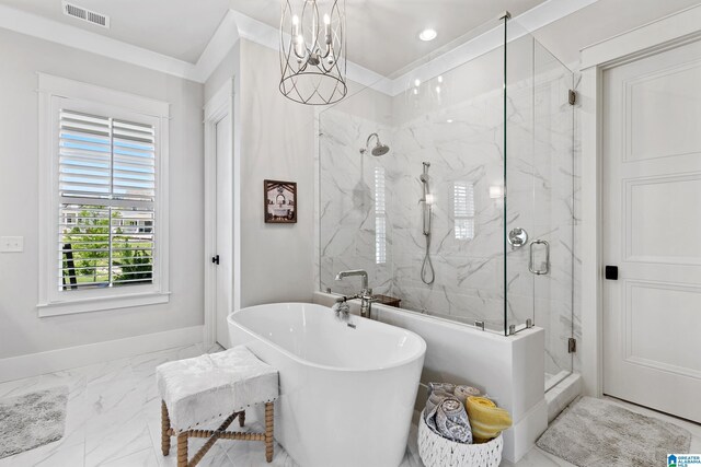 544 Preserve Way, Hoover, AL 35226 - bathroom with a marble finish shower, marble finish floors, a freestanding bath, and a chandelier