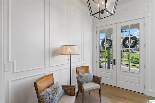 544 Preserve Way, Hoover, AL 35226 - sitting room featuring light wood-style floors, french doors, and a chandelier