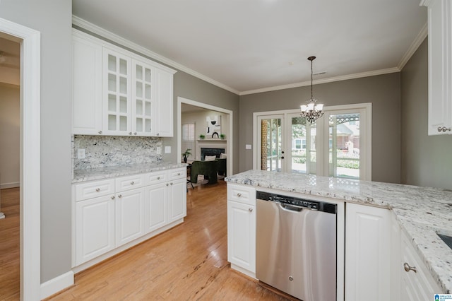 932 Cove Cir, Hoover, AL 35244 - kitchen featuring dishwasher, light wood-type flooring, tasteful backsplash, glass insert cabinets, and white cabinets