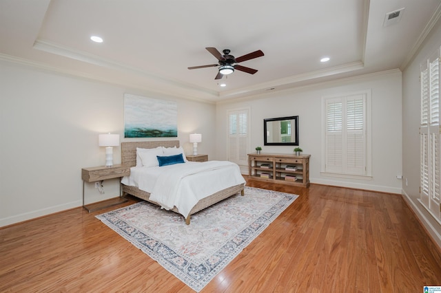 932 Cove Cir, Hoover, AL 35244 - bedroom with a raised ceiling, ornamental molding, wood finished floors, recessed lighting, and a ceiling fan