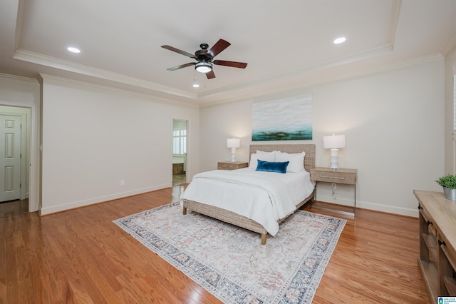 932 Cove Cir, Hoover, AL 35244 - bedroom with a tray ceiling, light wood finished floors, crown molding, recessed lighting, and ceiling fan