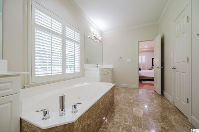 932 Cove Cir, Hoover, AL 35244 - ensuite bathroom featuring ornamental molding, vanity, and a jetted tub