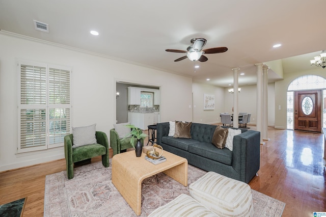 932 Cove Cir, Hoover, AL 35244 - living area featuring decorative columns, ornamental molding, wood finished floors, ceiling fan, and recessed lighting