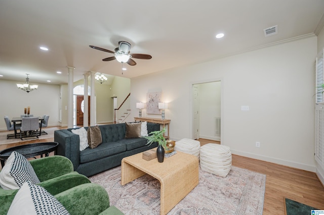 932 Cove Cir, Hoover, AL 35244 - living area featuring a chandelier, light wood-style floors, ceiling fan, stairway, and recessed lighting
