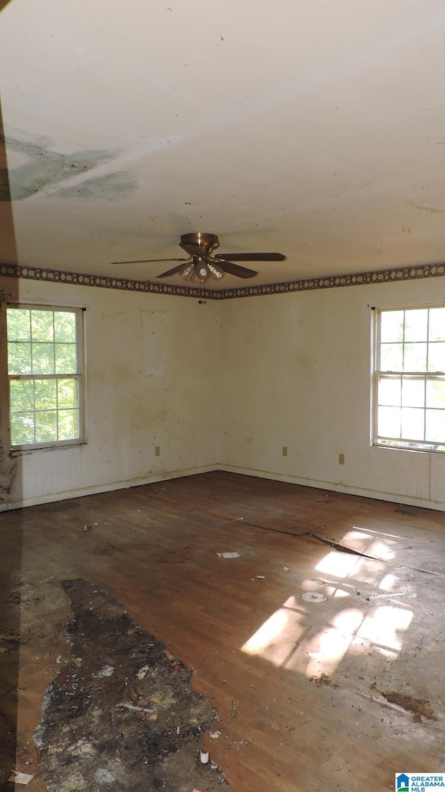 1146 Oakridge Dr, Leeds, AL 35094 - spare room featuring ceiling fan and wood finished floors