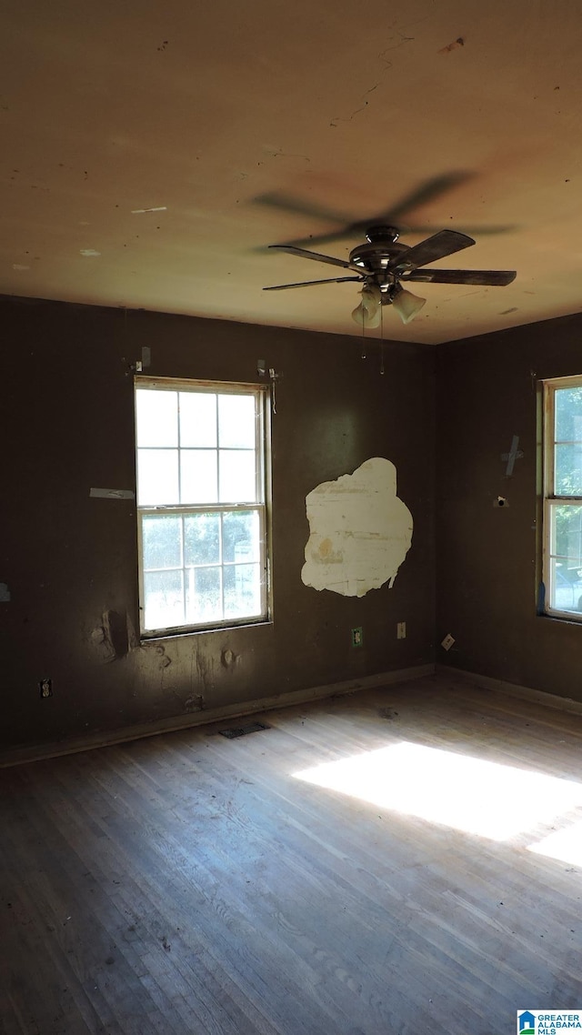1146 Oakridge Dr, Leeds, AL 35094 - unfurnished room with wood finished floors and ceiling fan