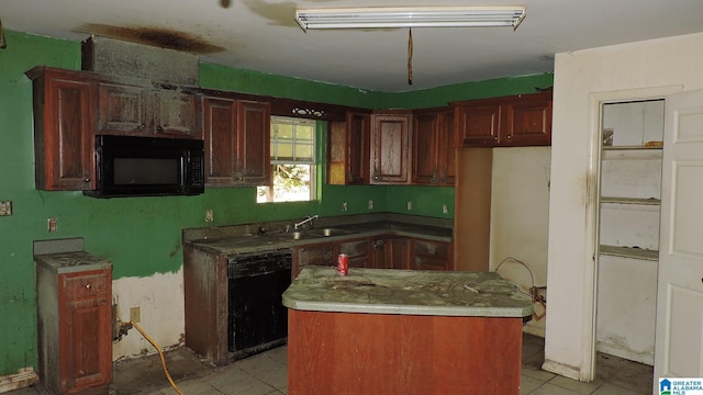 1146 Oakridge Dr, Leeds, AL 35094 - kitchen featuring black appliances, a kitchen island, and light tile patterned floors