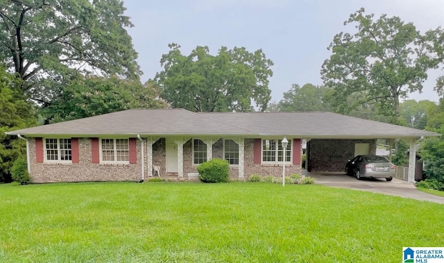 6592 Lynn Ave, Leeds, AL 35094 - single story home with a front yard, driveway, brick siding, and an attached carport