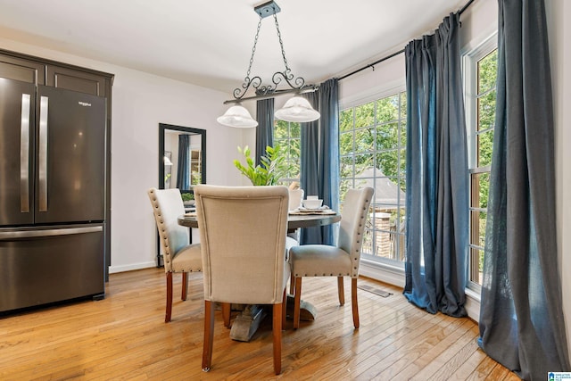 4737 Cloud Ln, Birmingham, AL 35243 - dining area featuring light wood-style floors and baseboards