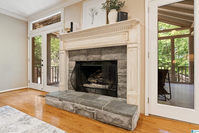 4737 Cloud Ln, Birmingham, AL 35243 - detailed view of wood finished floors, a tiled fireplace, and crown molding