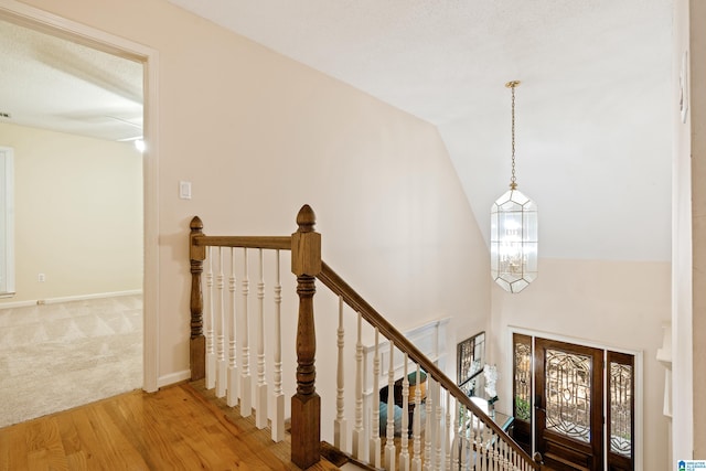 4737 Cloud Ln, Birmingham, AL 35243 - foyer with wood finished floors, a chandelier, high vaulted ceiling, and carpet floors