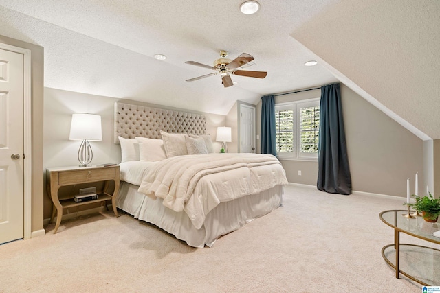 4737 Cloud Ln, Birmingham, AL 35243 - carpeted bedroom featuring a textured ceiling, vaulted ceiling, and ceiling fan