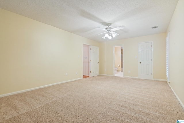 4737 Cloud Ln, Birmingham, AL 35243 - empty room featuring light carpet, ceiling fan, and a textured ceiling