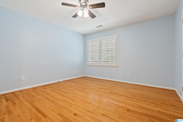 4737 Cloud Ln, Birmingham, AL 35243 - spare room with light wood-type flooring, a textured ceiling, and ceiling fan