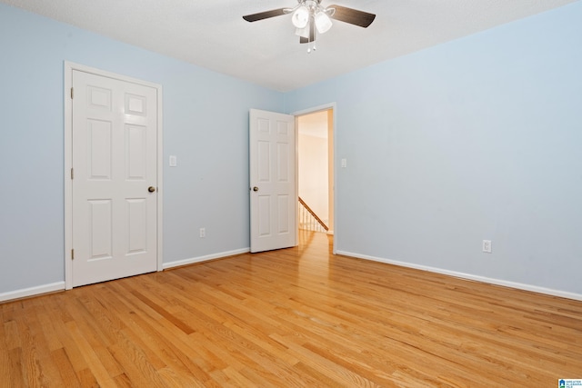 4737 Cloud Ln, Birmingham, AL 35243 - unfurnished bedroom with light wood finished floors and a ceiling fan