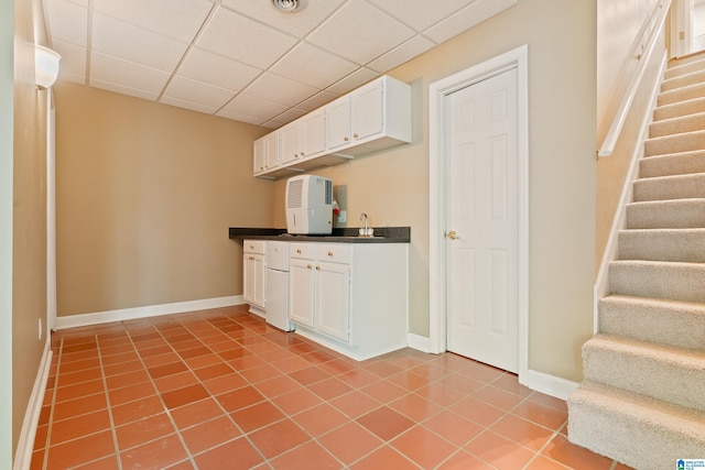 4737 Cloud Ln, Birmingham, AL 35243 - bar with stairs, light tile patterned floors, and a drop ceiling