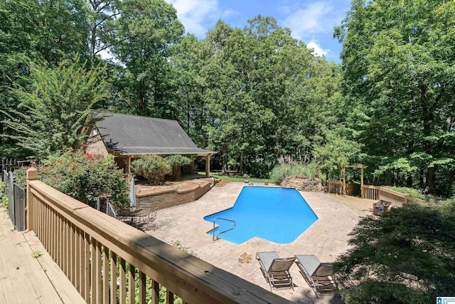 4737 Cloud Ln, Birmingham, AL 35243 - outdoor pool with a patio, an outdoor structure, and a storage structure