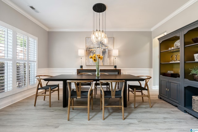 483 Old Cahaba Way, Helena, AL 35080 - dining room with ornamental molding, light wood-style floors, a decorative wall, a wainscoted wall, and a chandelier