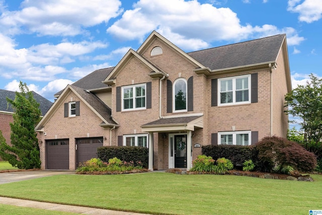 483 Old Cahaba Way, Helena, AL 35080 - traditional-style house with brick siding, concrete driveway, a front lawn, an attached garage, and a shingled roof