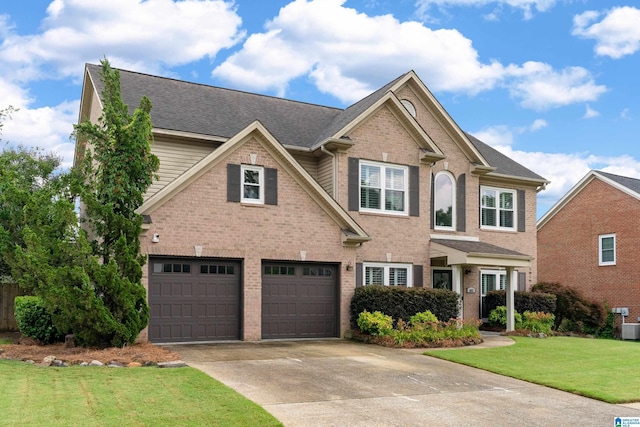 483 Old Cahaba Way, Helena, AL 35080 - view of front of house with an attached garage, brick siding, concrete driveway, a front yard, and a shingled roof