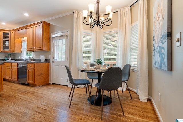 1812 Cross Cir, Hoover, AL 35244 - dining space featuring a chandelier, light wood-style floors, recessed lighting, and crown molding