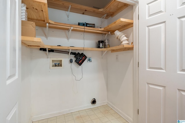 1812 Cross Cir, Hoover, AL 35244 - laundry area with electric dryer hookup, light tile patterned flooring, and hookup for a washing machine