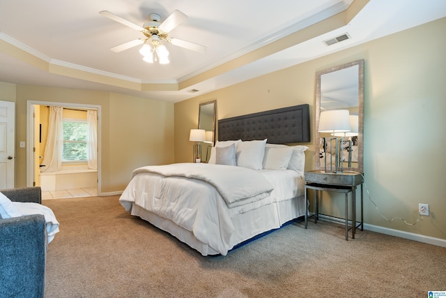 1812 Cross Cir, Hoover, AL 35244 - carpeted bedroom featuring a tray ceiling, ornamental molding, and a ceiling fan