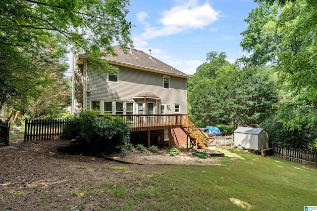 1812 Cross Cir, Hoover, AL 35244 - rear view of property featuring stairway, a wooden deck, a fenced backyard, and a shed