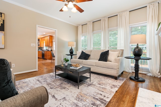 1812 Cross Cir, Hoover, AL 35244 - living room featuring a ceiling fan, crown molding, and wood finished floors