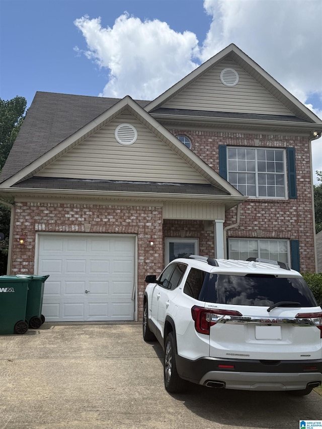 5977 Princess Blvd, Pinson, AL 35215 - view of front facade featuring concrete driveway, an attached garage, and brick siding